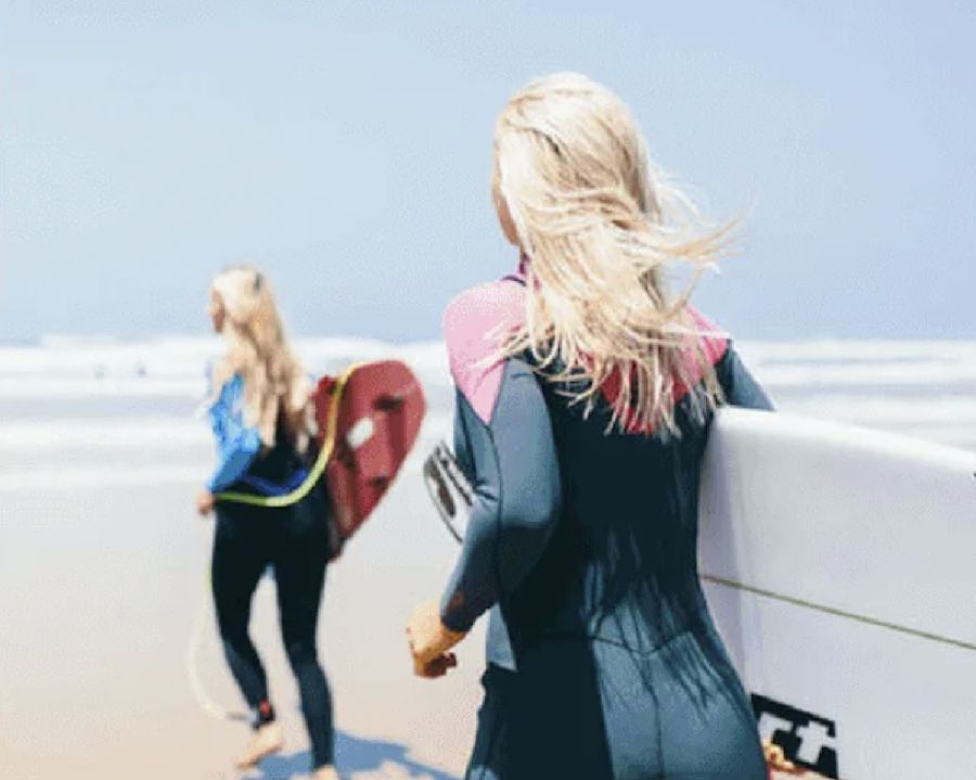 women with surf board