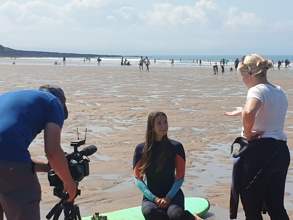 siona on a surf board